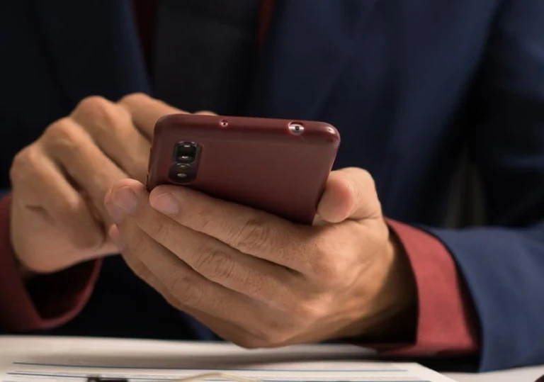 a lawyer using a cell phone