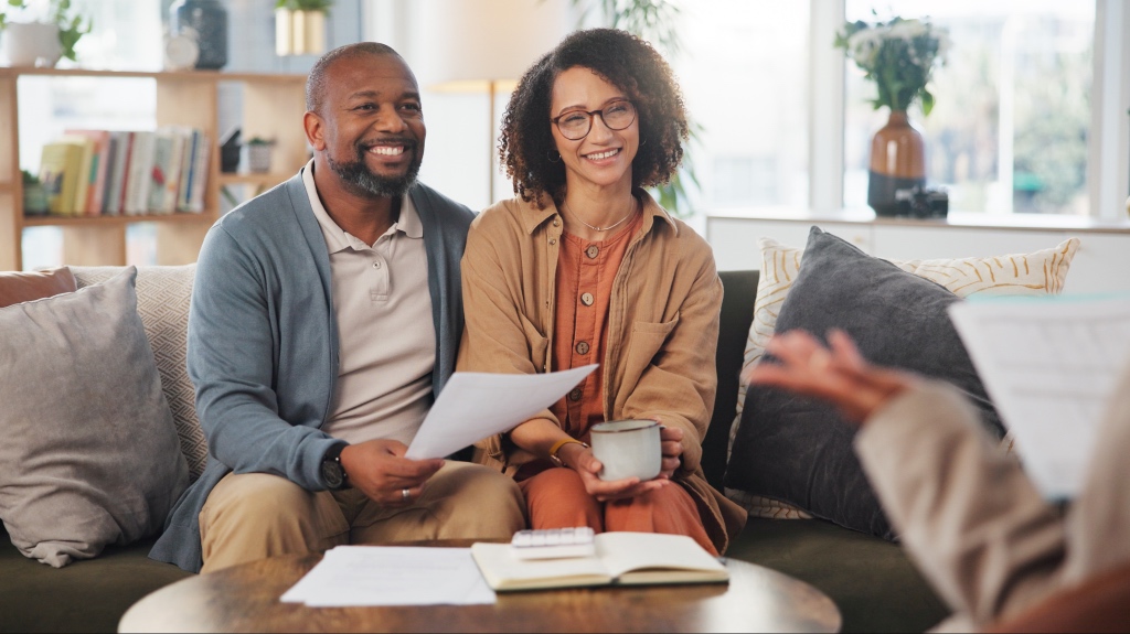 a couple meeting with an attorney