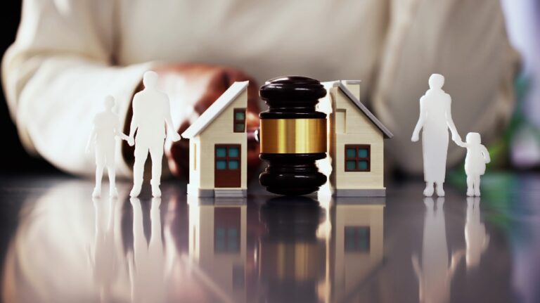 gavel separating a house and family