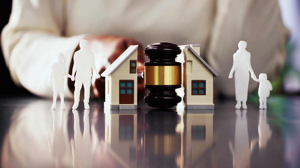 gavel separating a house and family