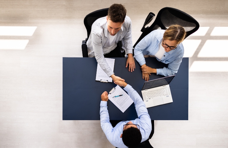 lawyer holds a meeting with a married couple